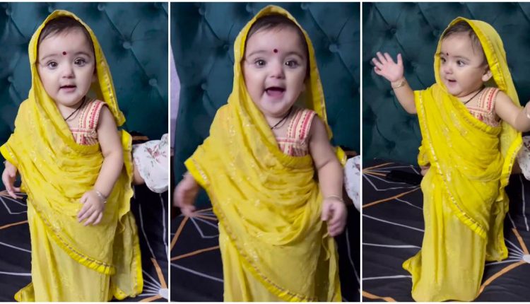 Yellow dressed Viral baby dance.